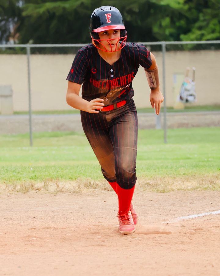 Mia Mead running the bases